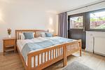 Schlafzimmer - Ferienhaus Sonnendeck mit Sauna, Kamin & Terrasse für 12 Personen - Top-Hundeurlaub