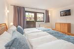 Schlafzimmer - Ferienhaus Sonnendeck mit Sauna, Kamin & Terrasse für 12 Personen - Top-Hundeurlaub