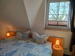 Schlafzimmer mit Doppelbett - Am Deich Haus 26 - Top-Hundeurlaub