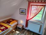 Schlafzimmer mit Einzelbetten - Am Deich Haus 26 - Top-Hundeurlaub