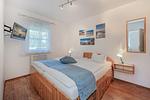 Schlafzimmer - Ferienwohnung Inselzauber nur 250 m zum Strand mit Terrasse und Kamin - Top-Hundeurlaub
