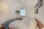 Schlafzimmer - Ferienwohnung Inselzauber nur 250 m zum Strand mit Terrasse und Kamin - Top-Hundeurlaub