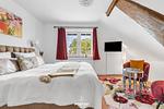 Schlafzimmer - Ferienwohnung Zum Garten Delve - Top-Hundeurlaub