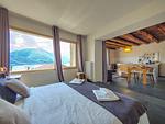 luxuriöses Schlafzimmer mit Doppelbett - Sunrise Lodge - Top-Hundeurlaub