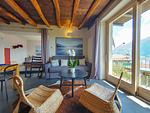 lichtdurchflutetes gemütliches Wohnzimmer mit großer Glasfront - Sunrise Lodge - Top-Hundeurlaub