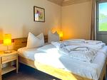 Schlafzimmer - Haus Sperber 4 W3 mit Sauna und Kamin - Top-Hundeurlaub