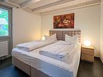 Schlafzimmer - Haus Sperber 4 E7 mit Sauna und Kamin - Top-Hundeurlaub