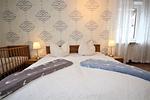 Schlafzimmer - Haus Strandgut Wohnung 1 - Top-Hundeurlaub