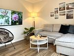 Wohnzimmer - FeWo - Coastal Residence 1, mit Garten, umzäunt - Top-Hundeurlaub