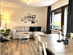 Wohnzimmer - FeWo - Coastal Residence 1, mit Garten, umzäunt - Top-Hundeurlaub