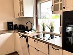 Küche / Küchenzeile - FeWo - Coastal Residence 1, mit Garten, umzäunt - Top-Hundeurlaub