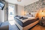 Schlafzimmer - Ferienwohnung #einzigartig - Top-Hundeurlaub