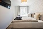 Schlafzimmer - Ferienwohnung #einzigartig - Top-Hundeurlaub