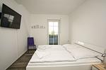 Schlafzimmer - Doppelhaus 2: Terrasse - Top-Hundeurlaub