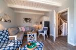 Über den Wohnbereich gelangen Sie direkt auf die Terrasse. - Haus am Leuchtturm Hausteil 1 - Top-Hundeurlaub
