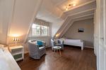 Das zweite Schlafzimmer verfügt über zwei Einzelbetten. - Haus am Leuchtturm Hausteil 1 - Top-Hundeurlaub