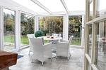 Im Wintergarten können Sie gemütliche Stunden verbringen. - Haus Stepenitz - Top-Hundeurlaub