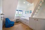 Das zweite Schlafzimmer verfügt über ein Einzelbett und ein ausziehbares Bett. - Haus Lichtblick - Top-Hundeurlaub