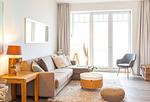 Wohnzimmer in der Ferienwohnung Amrumer Strandhaven in Wittdün - Amrumer Strandhaven - Top-Hundeurlaub