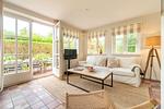 Über das Wohnzimmer gelangen Sie auf die Terrasse und in den Garten. - Pat’s Eckhus - Top-Hundeurlaub