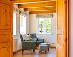 Ferienwohnung Stavanger Nebel/Amrum   Sitzecke mit zwei Sesseln und Fußhockern - Reetdachhaus Stavanger - Top-Hundeurlaub