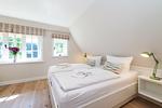 Schlafzimmer - Haus Carstensen Süd - Top-Hundeurlaub