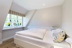 Schlafzimmer - Haus Carstensen Süd - Top-Hundeurlaub