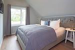 Schlafzimmer - Störtebekers Reethus mit Sauna, Kamin und Terrasse - Top-Hundeurlaub