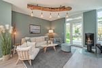 Wohnzimmer - Störtebekers Reethus mit Sauna, Kamin und Terrasse - Top-Hundeurlaub