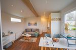 Wohnzimmer - Ferienhaus Ostseechalet Kompass Gelting - Top-Hundeurlaub