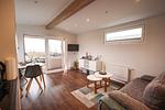 Wohnzimmer - Ferienhaus Ostseechalet Kompass Gelting - Top-Hundeurlaub