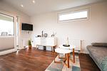 Wohnzimmer - Ferienhaus Ostseechalet Kompass Gelting - Top-Hundeurlaub