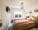 Schlafzimmer - Ferienwohnung Dünennest - Top-Hundeurlaub