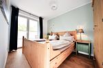 Ein gemütliches Bauernbett erwartet Sie hier. - Haus Blümlein Wangerooge - Top-Hundeurlaub