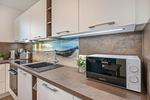 Küche / Küchenzeile - Ferienwohnung Tommy mit Sauna, Fitness und Kinderspielbereich - Top-Hundeurlaub
