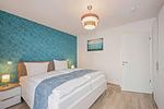 Schlafzimmer - Ferienwohnung Tommy mit Sauna, Fitness und Kinderspielbereich - Top-Hundeurlaub