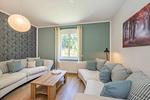 Wohnzimmer - Ferienhaus Oscar mit großen Garten, Terrasse und Grill - Top-Hundeurlaub