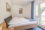 Schlafzimmer - Ferienwohnung Emily mit Garten, Sauna und Terrasse mit Grill - Top-Hundeurlaub