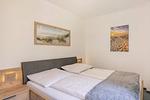 Schlafzimmer - Ferienwohnung Emily mit Garten, Sauna und Terrasse mit Grill - Top-Hundeurlaub