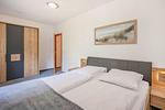 Schlafzimmer - Ferienwohnung Emily mit Garten, Sauna und Terrasse mit Grill - Top-Hundeurlaub
