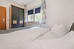 Schlafzimmer - Ferienwohnung Emily mit Garten, Sauna und Terrasse mit Grill - Top-Hundeurlaub