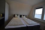 Schlafzimmer - Wohnung Seestern - Top-Hundeurlaub