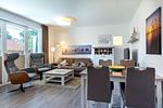 Wohn-/Essbereich mit Sitzgelegenheiten - Aparthotel Ostseeallee 4-30 - Top-Hundeurlaub