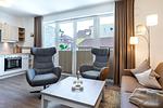 Wohn-/Essbereich mit Zugang zur Terrasse - Aparthotel Ostseeallee 4-30 - Top-Hundeurlaub