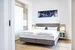 Schlafzimmer mit Doppelbett und Kleiderschrank - Krusespeicher 2-41 - Top-Hundeurlaub