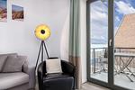 Wohnbereich mit Sessel, Couch und Ausblick - Ohlerich Speicher 2-13 - Top-Hundeurlaub