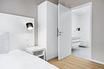 Schlafzimmer mit Einzelbett - Strandresidenzen Binz-Prora D0.5 - Top-Hundeurlaub