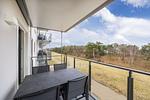 Überdachter Balkon mit Sitzgelegenheit - Strandresidenzen Binz-Prora D3.4 - Top-Hundeurlaub