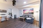 Wohn-Essbereich mit Couch - Ohlerich Speicher 1-01 - Top-Hundeurlaub