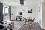Wohn-Essbereich mit Couch und Esstisch - Ohlerich Speicher 4-22 - Top-Hundeurlaub
